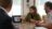 Image of our designer, Izzy and our developer, Ian, presenting to a client.